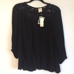 Black flowy blouse.